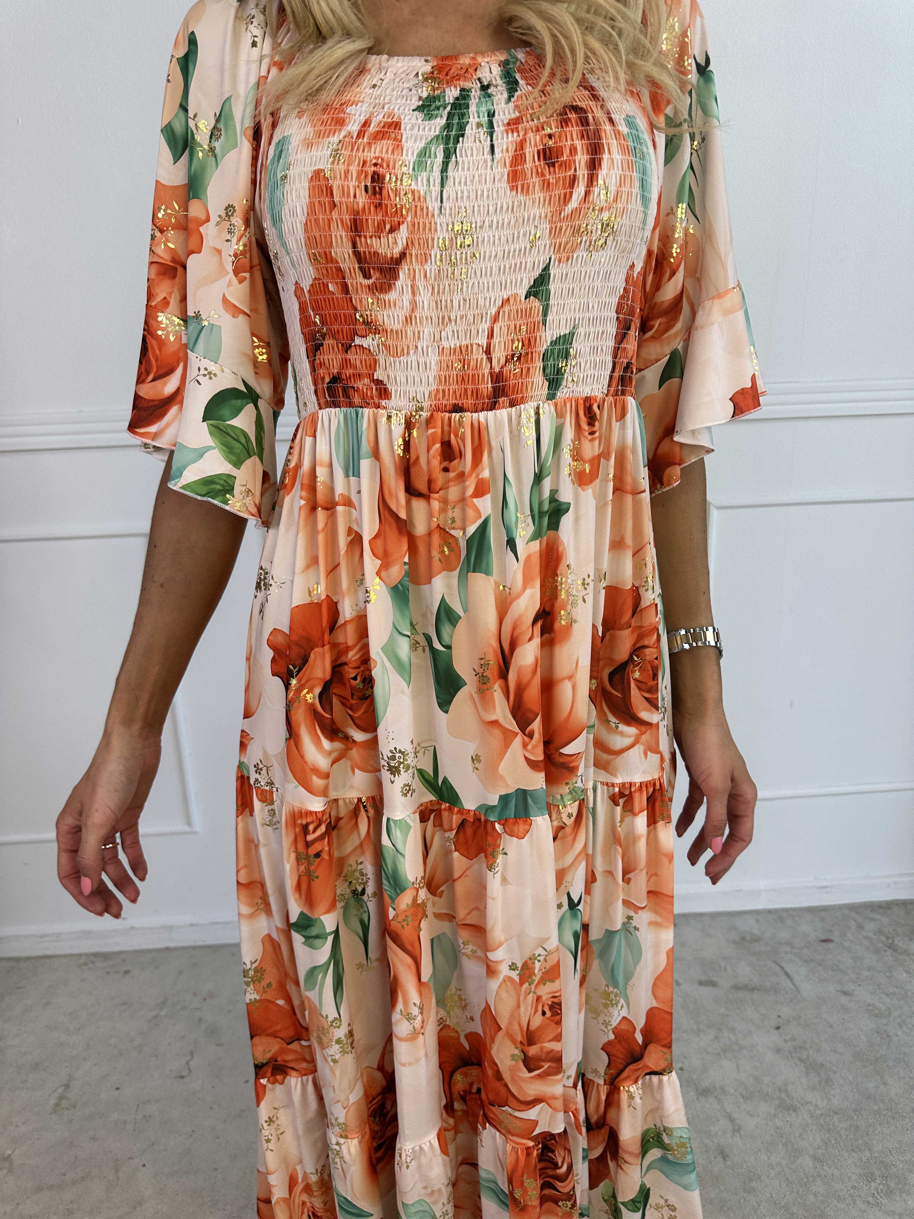 Elna Flower - Blomstret elastisk kjole med smock over brystet